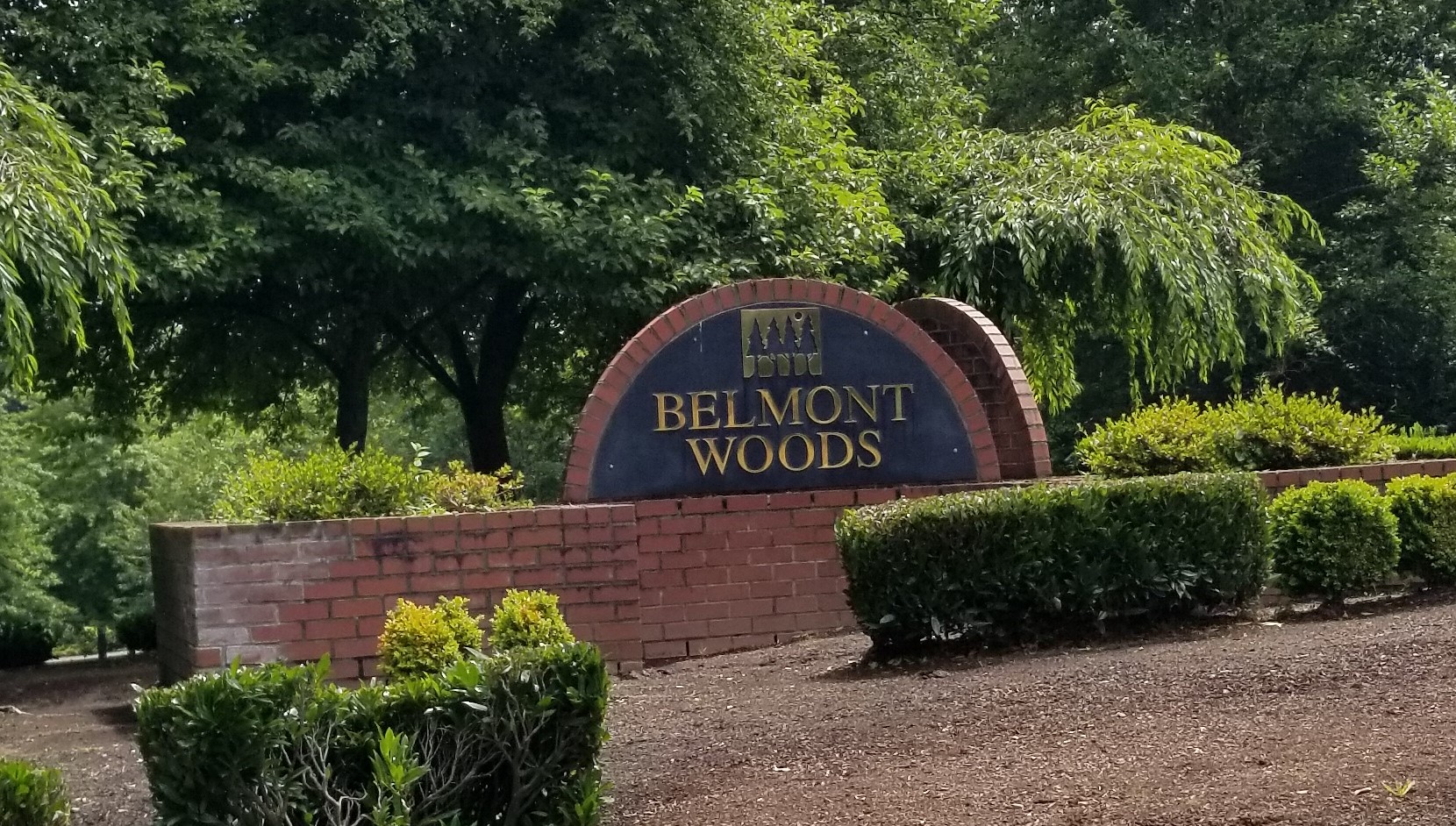 The Belmont Woods Homeowners Association   Logo 